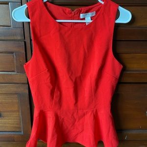 Red peplum top size medium